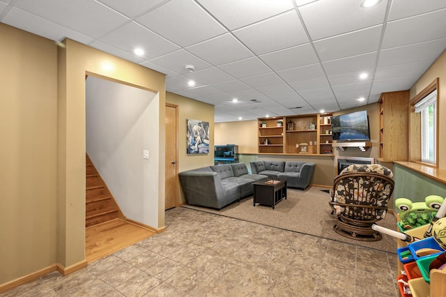 2572 91st Ln NE, Blaine, MN 55449 - living room with recessed lighting, a drop ceiling, and baseboards