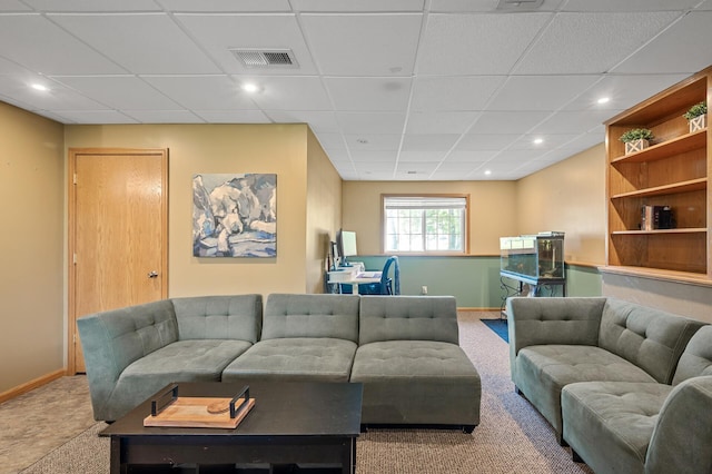 2572 91st Ln NE, Blaine, MN 55449 - carpeted living area featuring a paneled ceiling, baseboards, and recessed lighting