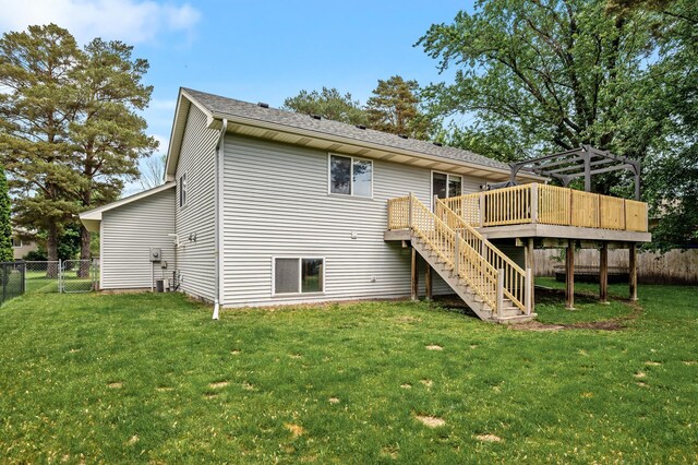 2572 91st Ln NE, Blaine, MN 55449 - back of house featuring stairs and a wooden deck