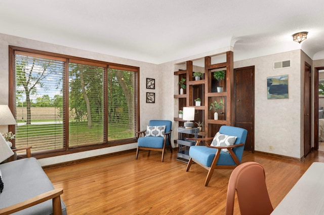 10180 County Road 43, Laketown Twp, MN 55318 - living area with wood finished floors and baseboards