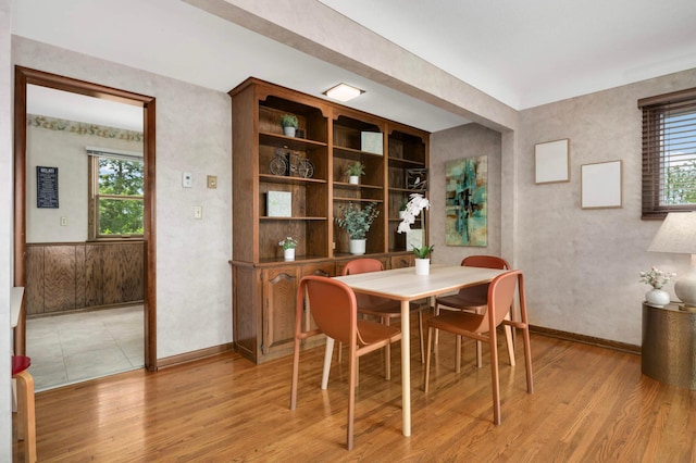 10180 County Road 43, Laketown Twp, MN 55318 - dining area featuring light wood-style flooring and baseboards