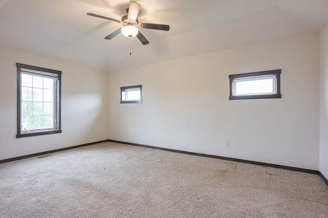 12396 67th St NE, Otsego, MN 55330 - carpeted empty room featuring baseboards and a ceiling fan