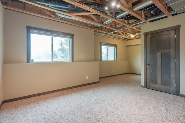 12396 67th St NE, Otsego, MN 55330 - spare room featuring carpet flooring and baseboards