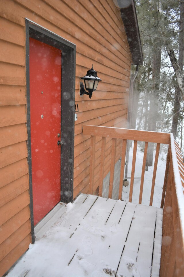 15326 Birch Point Rd, Lenroot Twp, WI 54843 - view of snow covered property entrance