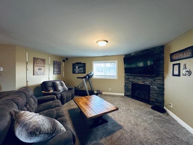 1320 Whiting Rd NW Unit 41, Bemidji, MN 56601 - carpeted living room with a stone fireplace and baseboards