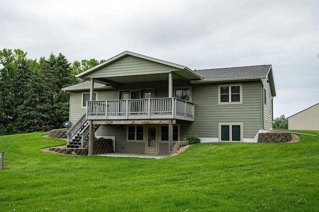 2851 120th Ave SW, Willmar, MN 56201 - back of house with a yard, a wooden deck, a patio area, and a shingled roof