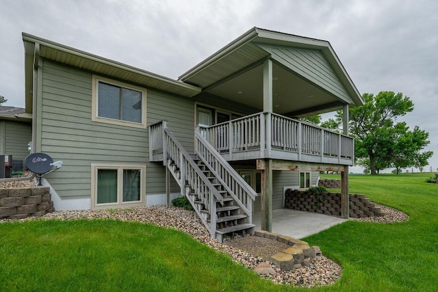 2851 120th Ave SW, Willmar, MN 56201 - rear view of house with a lawn, stairs, a deck, and a patio
