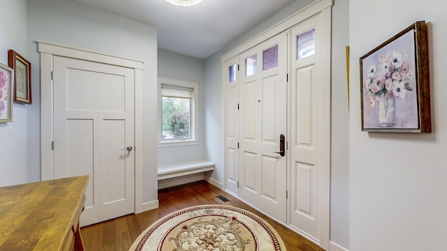 1829 Traders Point Ln SW, Rochester, MN 55902 - entrance foyer featuring dark wood-style flooring and baseboards