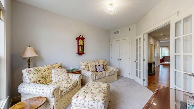 1829 Traders Point Ln SW, Rochester, MN 55902 - living area featuring french doors and wood finished floors