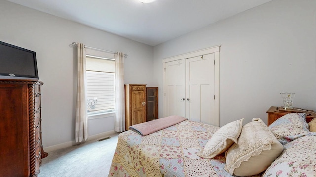 1829 Traders Point Ln SW, Rochester, MN 55902 - bedroom with carpet, baseboards, and a closet