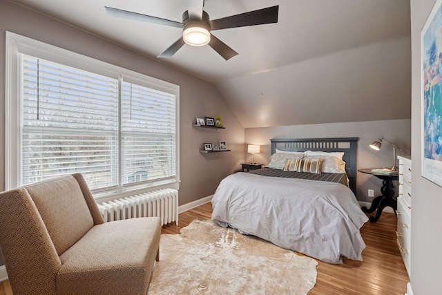 5117 48th St, Edina, MN 55436 - bedroom with radiator heating unit, baseboards, vaulted ceiling, wood finished floors, and ceiling fan