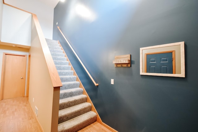 2778 Ridgeview Ln, Red Wing, MN 55066 - stairs with wood finished floors and baseboards