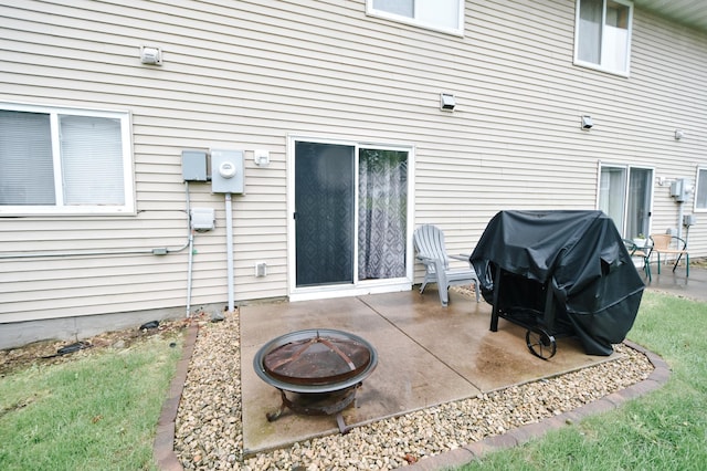 2778 Ridgeview Ln, Red Wing, MN 55066 - rear view of house featuring a fire pit and a patio area