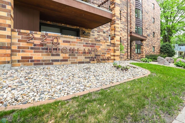 220 8th St S Unit B2, Fargo, ND 58103 - entrance to property featuring brick siding and a balcony