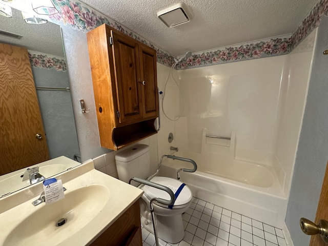39 Round Lake Trl, Little Canada, MN 55117 - bathroom with a textured ceiling, tile patterned flooring, toilet, bathing tub / shower combination, and vanity