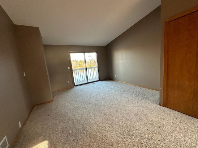 39 Round Lake Trl, Little Canada, MN 55117 - carpeted spare room with vaulted ceiling and baseboards