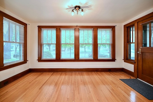 919 Howard St, Winona, MN 55987 - unfurnished sunroom featuring french doors
