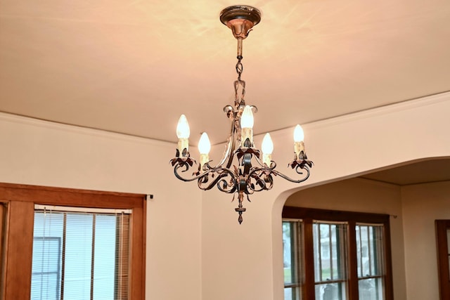 919 Howard St, Winona, MN 55987 - detailed view of arched walkways, a chandelier, and ornamental molding
