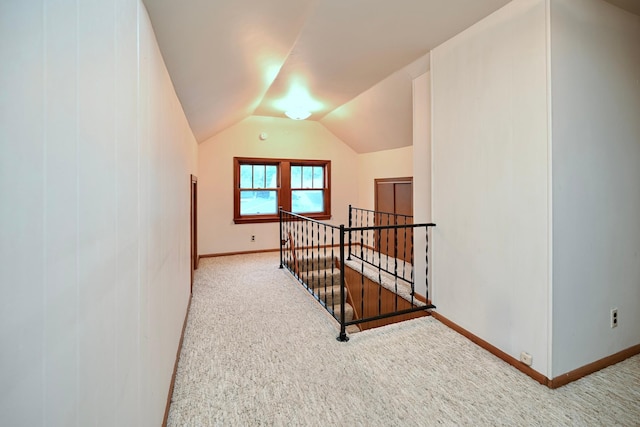 919 Howard St, Winona, MN 55987 - bonus room featuring carpet flooring, baseboards, and vaulted ceiling