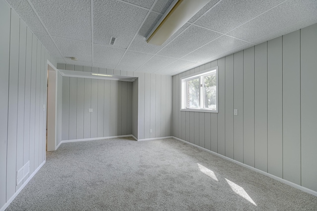 4207 Fillmore St NE, Columbia Heights, MN 55421 - empty room with carpet floors and wood walls