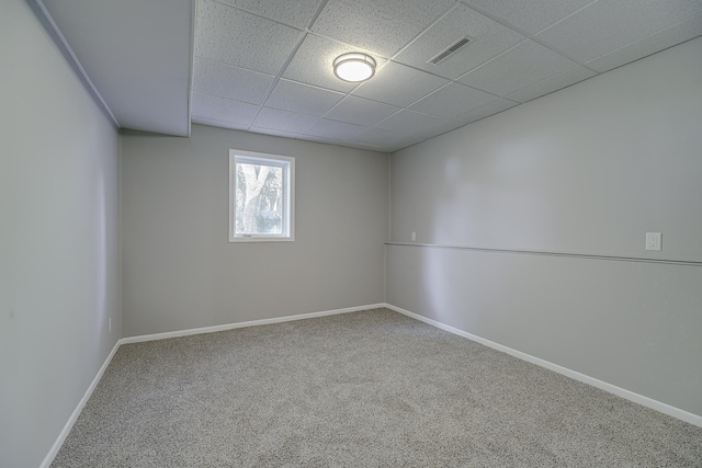 4207 Fillmore St NE, Columbia Heights, MN 55421 - carpeted spare room with a paneled ceiling and baseboards