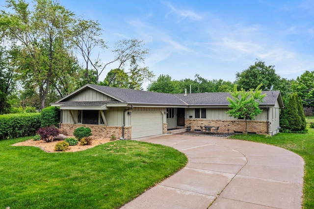 4017 Kentucky Ave N, Crystal, MN 55427 - ranch-style house with board and batten siding, brick siding, concrete driveway, a garage, and a front yard
