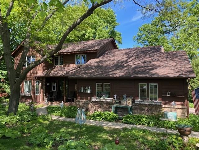 7481 Mariner Dr, Maple Grove, MN 55311 - rear view of property featuring brick siding