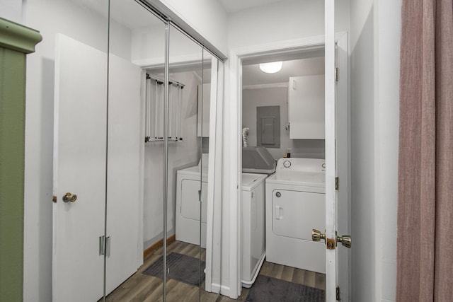 4721 Cedar Lake Rd S Unit 8, Saint Louis Park, MN 55416 - laundry area featuring washer and dryer, cabinet space, electric panel, and dark wood-style floors