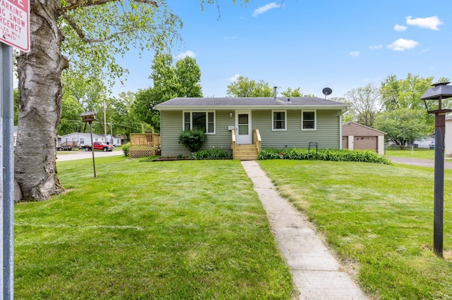1224 N St NE, Brainerd, MN 56401 - view of front facade with a front lawn and a detached garage