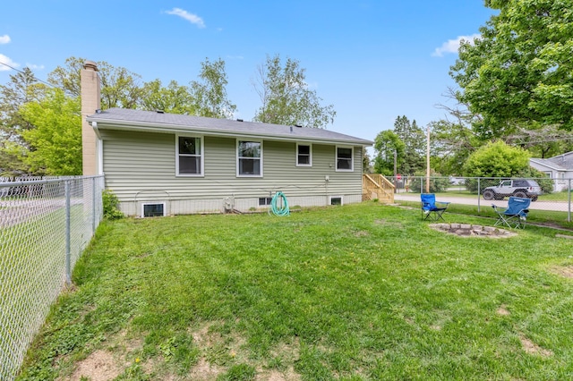 1224 N St NE, Brainerd, MN 56401 - rear view of property featuring a chimney