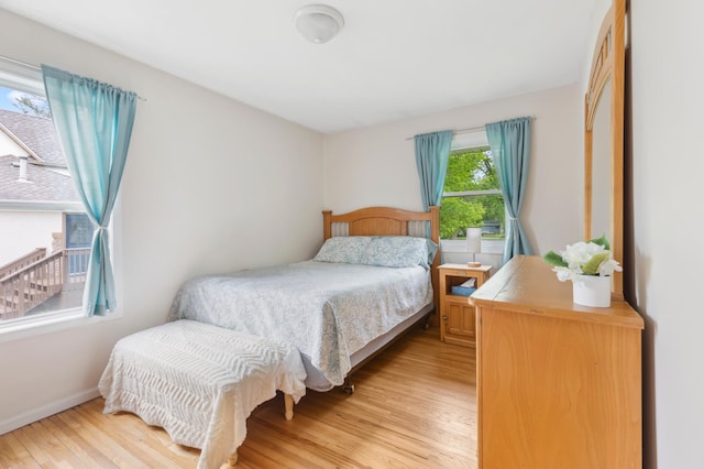 1224 N St NE, Brainerd, MN 56401 - bedroom with light wood-style floors and baseboards