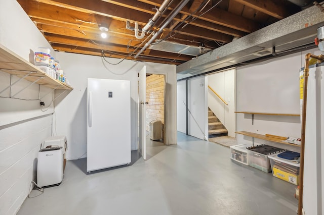 1224 N St NE, Brainerd, MN 56401 - basement featuring freestanding refrigerator and stairway