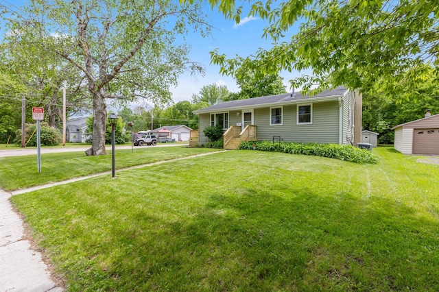 1224 N St NE, Brainerd, MN 56401 - view of front of property with an outdoor structure and a front lawn