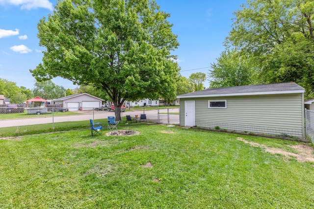 1224 N St NE, Brainerd, MN 56401 - view of yard featuring a garage and an outdoor structure