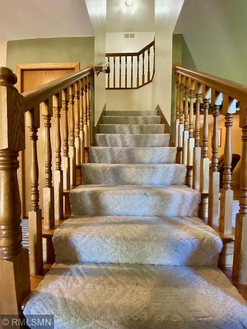 23110 Grandview Loop, Long Prairie Twp, MN 56347 - stairs featuring wood finished floors