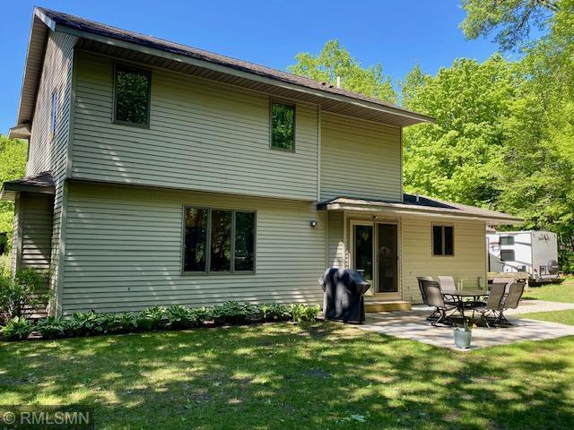 23110 Grandview Loop, Long Prairie Twp, MN 56347 - back of property featuring a yard and a patio area