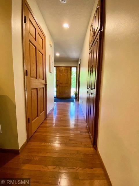 23110 Grandview Loop, Long Prairie Twp, MN 56347 - hall featuring hardwood / wood-style floors, recessed lighting, and baseboards