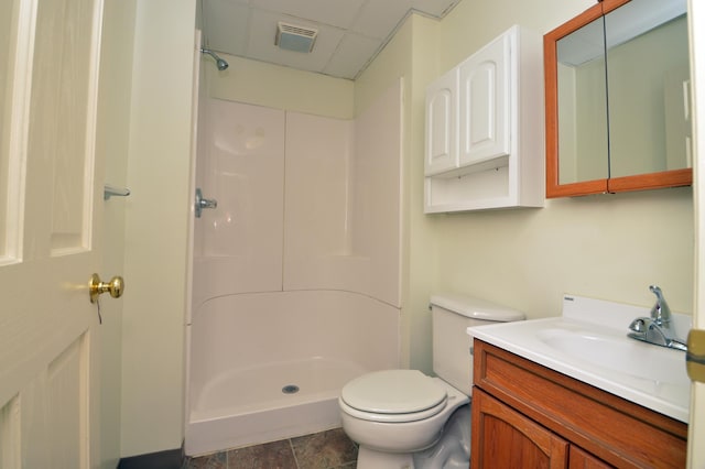 508 6th Ave S, Saint Cloud, MN 56301 - bathroom with a shower, vanity, toilet, and a paneled ceiling