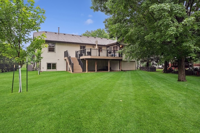 656 Mina Ct, Mahtomedi, MN 55082 - rear view of house featuring stairs, a wooden deck, a yard, and a shingled roof