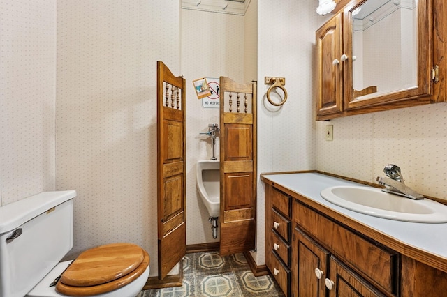 656 Mina Ct, Mahtomedi, MN 55082 - bathroom featuring wallpapered walls and vanity
