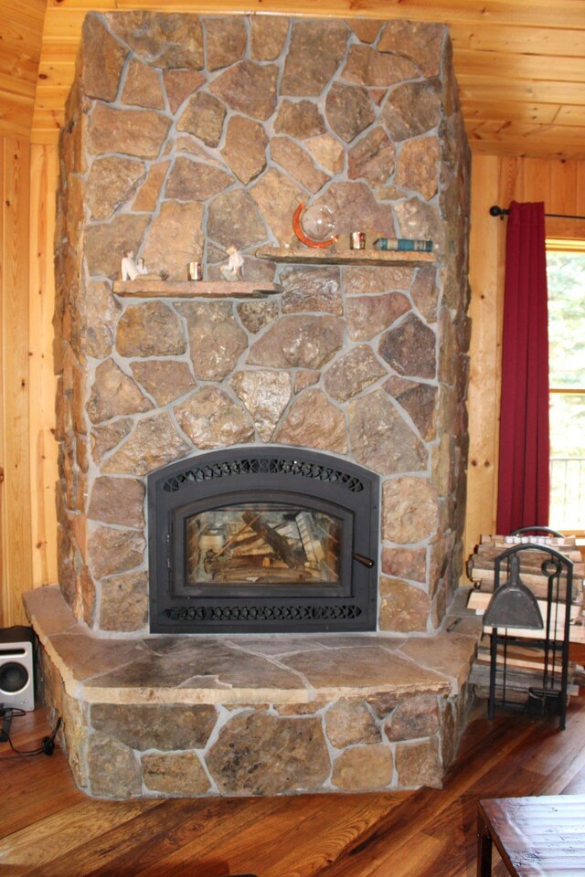 1729 Quail Ln NE, Longville, MN 56655 - detailed view of wood finished floors, wooden ceiling, and a stone fireplace
