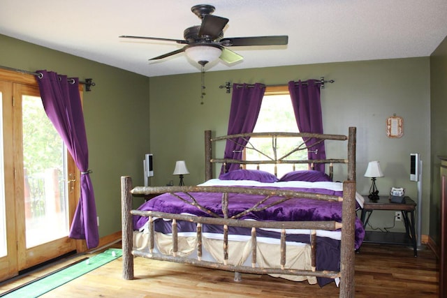 1729 Quail Ln NE, Longville, MN 56655 - bedroom featuring wood finished floors and a ceiling fan