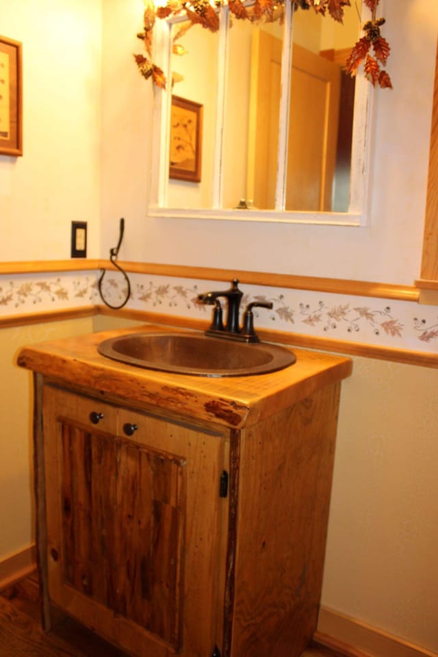 1729 Quail Ln NE, Longville, MN 56655 - bathroom with vanity and wood finished floors