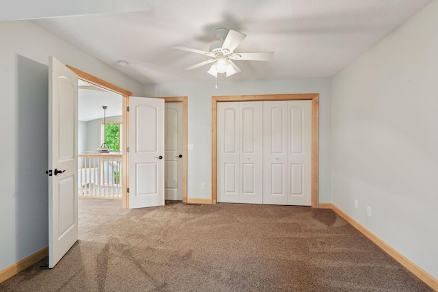 9885 Troy Ln N, Maple Grove, MN 55311 - unfurnished bedroom featuring carpet flooring, baseboards, a closet, and a ceiling fan