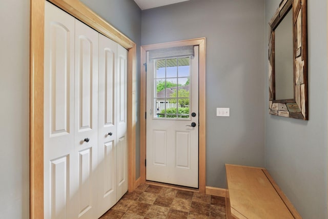 9885 Troy Ln N, Maple Grove, MN 55311 - doorway to outside featuring baseboards