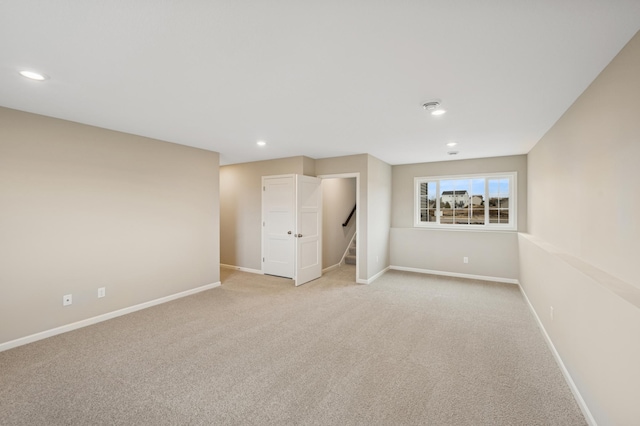 451 Mallard St NE, Hanover, MN 55341 - unfurnished bedroom with baseboards, light carpet, and recessed lighting