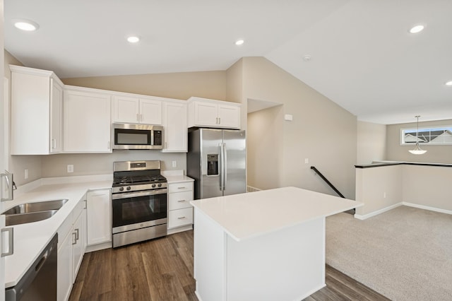 451 Mallard St NE, Hanover, MN 55341 - kitchen featuring stainless steel appliances, a sink, lofted ceiling, dark wood finished floors, and white cabinets