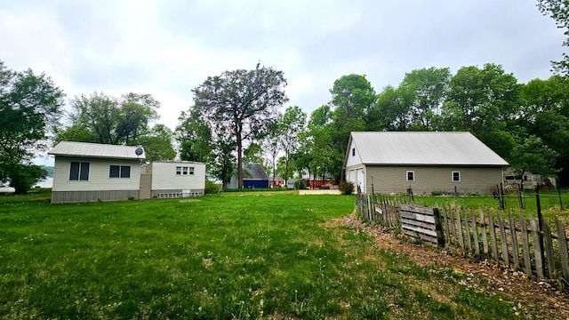 33798 Shady Oak Dr, Foster Twp, MN 56225 - view of yard with an outdoor structure and a garage