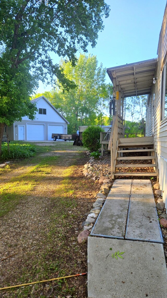 33798 Shady Oak Dr, Foster Twp, MN 56225 - view of yard with a detached garage and an outdoor structure