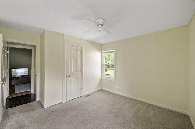 3364 85th Ave, Princeton, MN 55371 - unfurnished bedroom with carpet flooring, baseboards, and ceiling fan